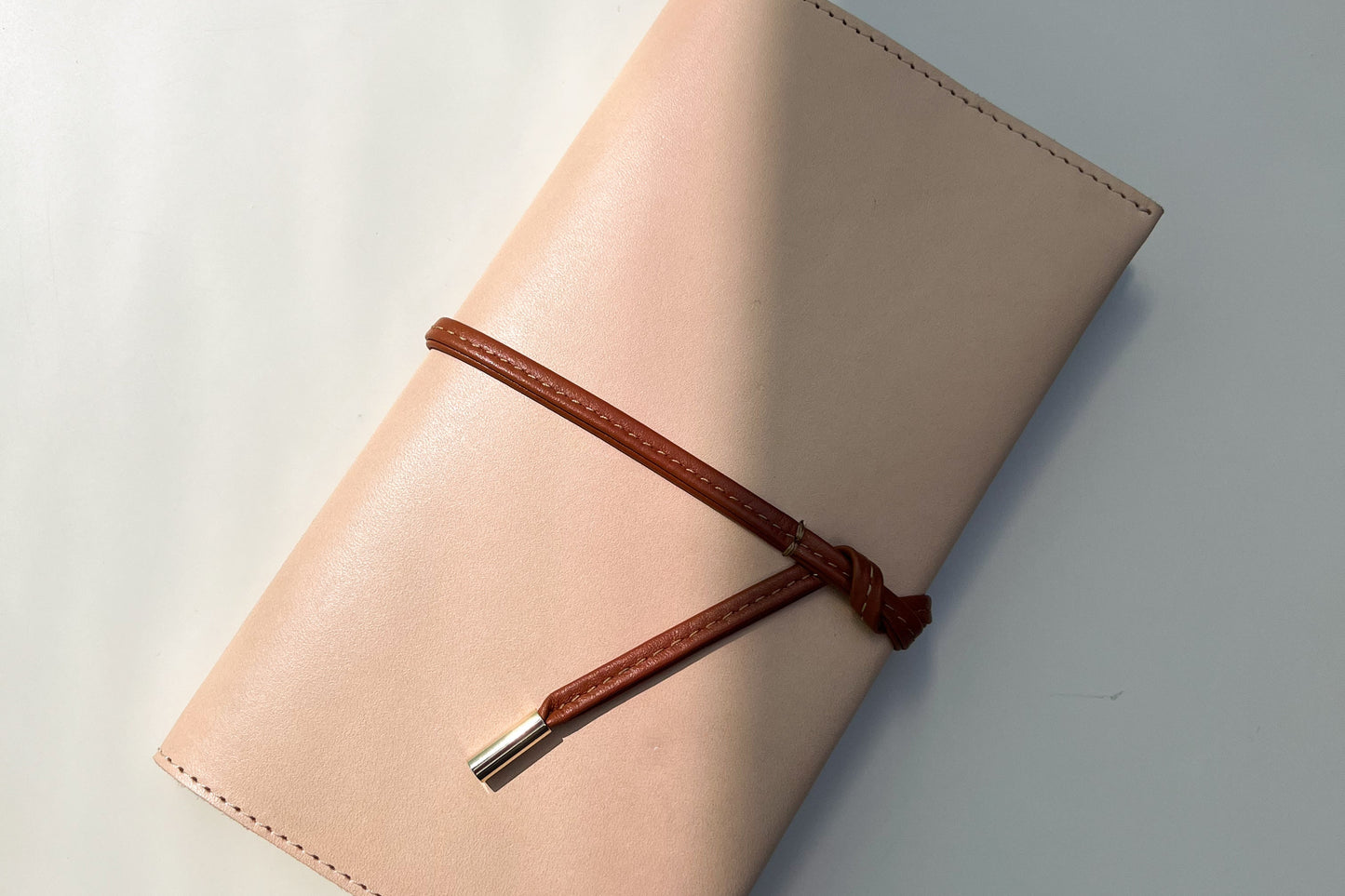 CADERNO COM CAPA EM PELE